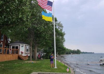 Flag Pole Near Lake